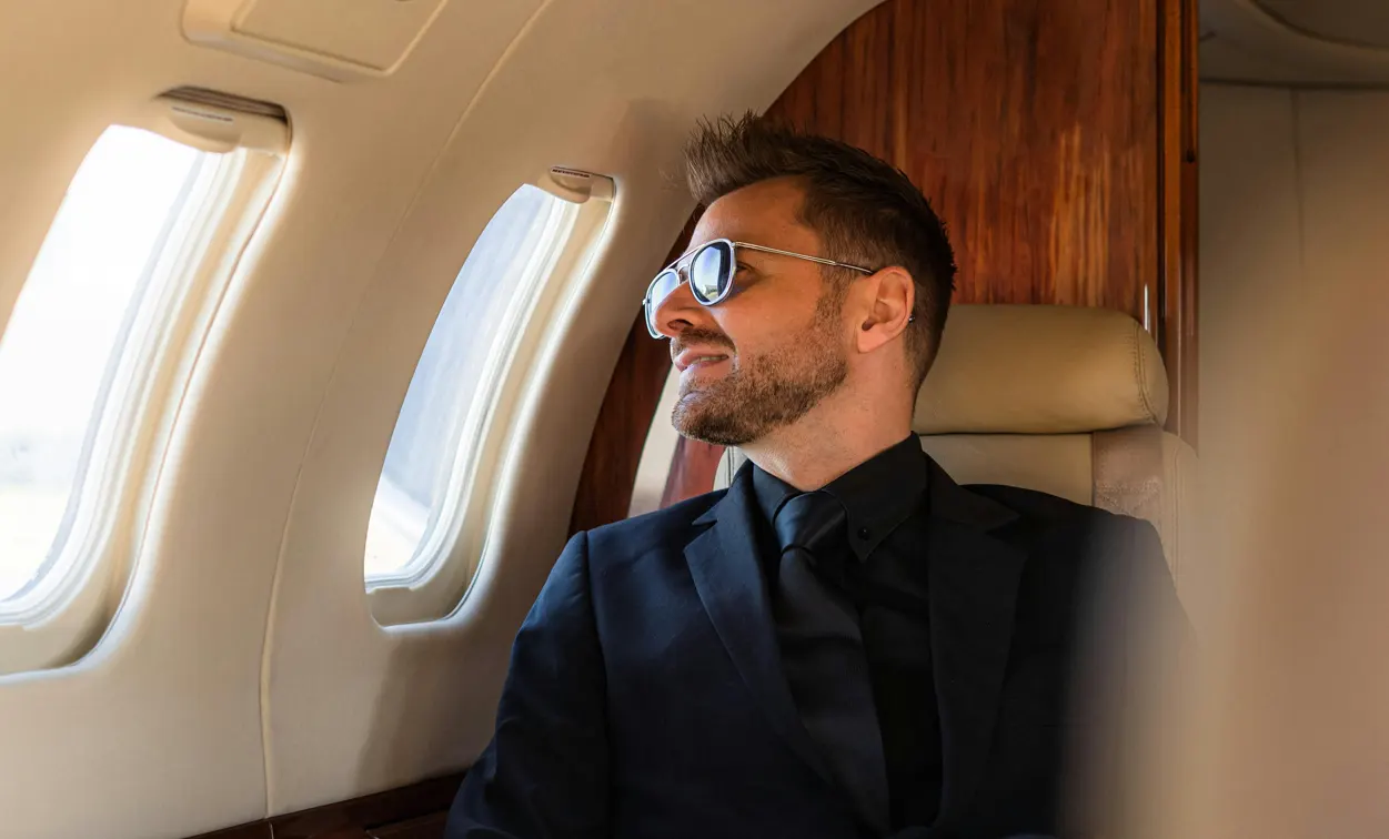 Business traveller in jet